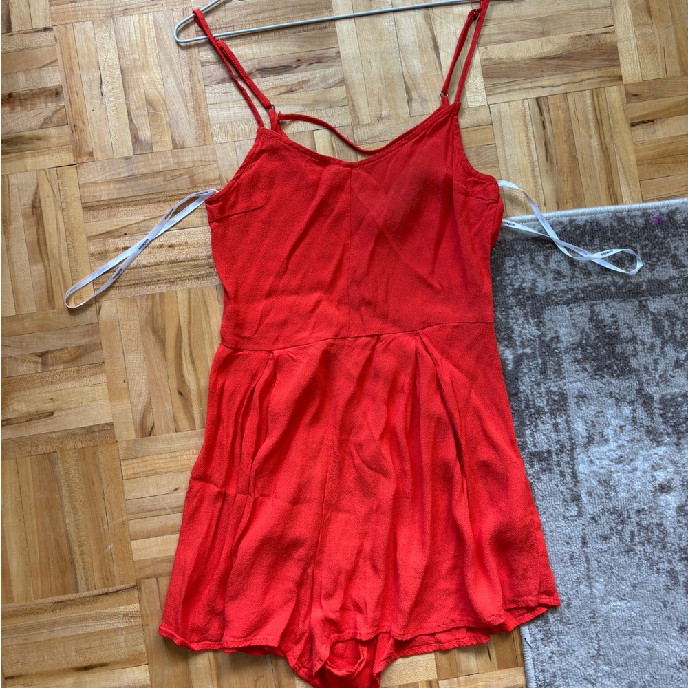 Red romper from MINKPINK